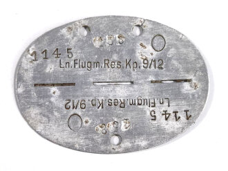 Erkennungsmarke Wehrmacht aus Aluminium eines Angehörigen " Ln.Flugm.Res.Kp.9/12 " Luftnachrichten.Flugmelde.Reserve.Kompanie 9/12