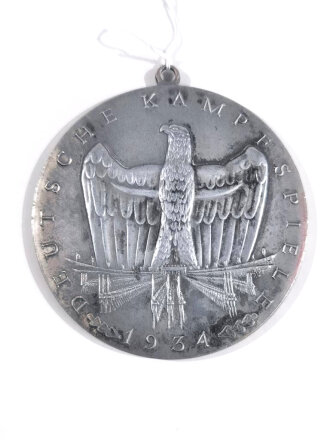 Tragbare Siegermedaille " Deutsche Kampfspiele 1934" Zink versilbert, Durchmesser 80mm