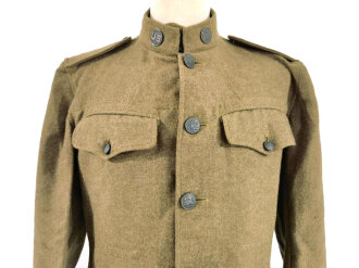U.S. WWI Model 1917 tunic, member of the Engineer Corps Headquarter in the 8th Army. One overseas service chevron. British war department stamp inside tunic.