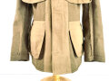 U.S. WWI Model 1917 tunic, member of the Engineer Corps Headquarter in the 8th Army. One overseas service chevron. British war department stamp inside tunic.