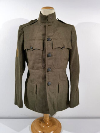 U.S. WWI Model 1917 tunic, belonged to a saddler in the...