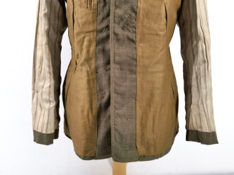 U.S. WWI Model 1917 tunic, belonged to a saddler in the 1st AEF Corps. One overseas chevron