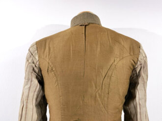 U.S. WWI Model 1917 tunic, belonged to a saddler in the 1st AEF Corps. One overseas chevron