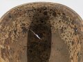 U.S. WWII M1 steel helmet. Water recovered