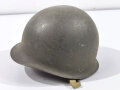 U.S.after  WWII M1 steel helmet. Back seam shell, liner maybe WWII with replaced swaet and neck band.