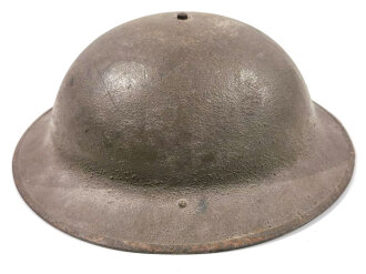 US WWII M1917A1 Kelly Type Helmet. Basically a modified WWI M17 helmet. In use till the M1 helmet took place. Nice exsample, original paint and correct liner and chin strap