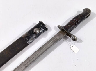 USA  1.Weltkrieg, Seitengewehr Modell 1917 mit Lederscheide, diese mit geschwärzten Metallbeschlägen, runder Trageknopf, aus englischen Beständen an die USA geliefert
