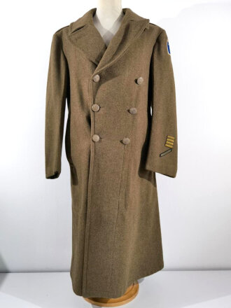 U.S. 1943 dated wool overcoat. Size 36R. Good condition, Most likely original sewn "Engineer amphibian unit" patch and four overseas service bars.