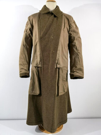 U.S. 1943 dated wool overcoat. Size 36R. Good condition, Most likely original sewn "Engineer amphibian unit" patch and four overseas service bars.