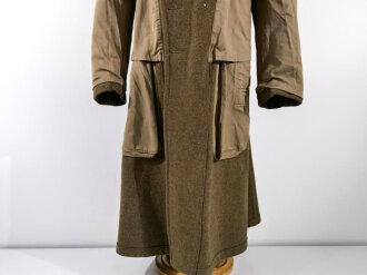 U.S. 1943 dated wool overcoat. Size 36R. Good condition, Most likely original sewn "Engineer amphibian unit" patch and four overseas service bars.