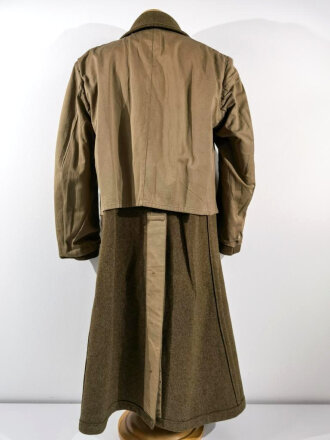 U.S. 1943 dated wool overcoat. Size 36R. Good condition, Most likely original sewn "Engineer amphibian unit" patch and four overseas service bars.