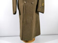 U.S. 1943 dated wool overcoat. Size 36R. Good condition, Most likely original sewn "Engineer amphibian unit" patch and four overseas service bars.