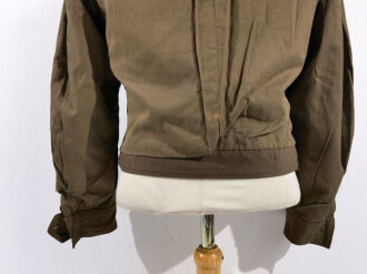 U.S. 1944 dated Army Air Forces "Ike jacket" Label faded, size 34R. Insignia original sewn, used