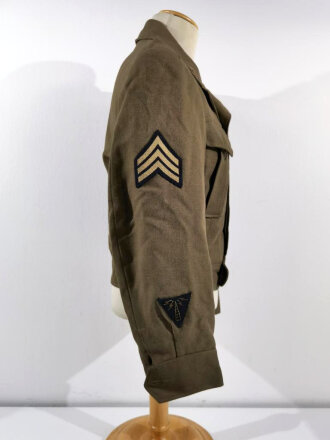 U.S. 1944 dated Army Air Forces "Ike jacket" Label faded, size 34R. Insignia original sewn, used