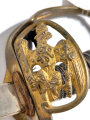 Kaiserreich, Preußen, Infanterie- Offiziersdegen Modell  1889 mit Klappkorb, vernickelte Klinge leicht angeschliffen, Scheide goldfarben überlackiert, Messingteile des Griffes mit Vergoldungsresten, ungereinigt