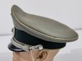 Schirmmütze für einen Offizier der Infanterie. Hersteller Beuriger Kaiserslautern. Kopfgrösse 57.