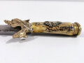 Hirschfänger 19.Jahrhundert, Deutschland, Hirschhorngriff mit aufgelegtem Hirschkopfemblem, 2 gekreuzte Perkussionsgewehre, Gesamtlänge 62cm
