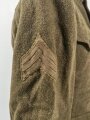 U.S. WWI AEF Model 1917 Tunic, member of an "Advanced Service of Supply" unit Two overseas stripes, good condition, label dated July 1918