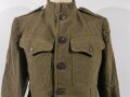 U.S. WWI AEF Model 1917 Tunic, member of an "Advanced Service of Supply" unit Two overseas stripes, good condition, label dated July 1918