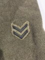 U.S. WWI AEF Model 1917 Tunic, member of an "Advanced Service of Supply" unit Two overseas stripes, good condition, label dated July 1918