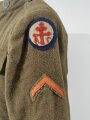 U.S. WWI AEF Model 1917 Tunic, member of an "Advanced Service of Supply" unit Two overseas stripes, good condition, label dated July 1918