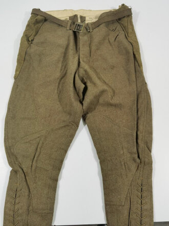 U.S. WWI wool pants. Has most likely seen some use after...