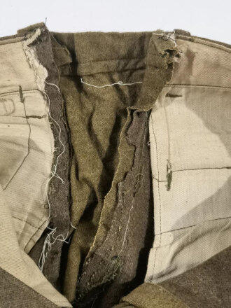 U.S. WWI wool pants. Has most likely seen some use after the war