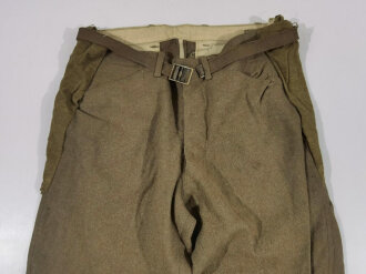 U.S. WWI wool pants. Has most likely seen some use after...