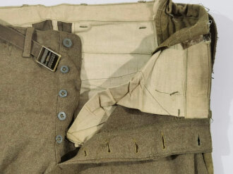 U.S. WWI wool pants. Has most likely seen some use after the war