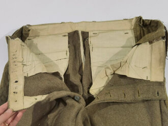 U.S. WWI wool pants. Has most likely seen some use after the war