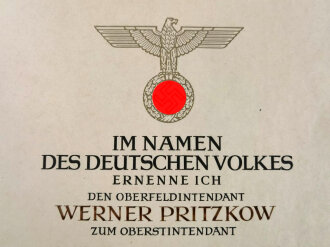 Adolf Hitler, eigenhändige Unterschrift auf großformatiger Ernennungsurkunde zum Oberstintendant, datiert 1943. Guter Zustand, in der eierschalfarbenen Mappe