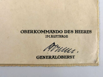 Adolf Hitler, eigenhändige Unterschrift auf großformatiger Ernennungsurkunde zum Oberstintendant, datiert 1943. Guter Zustand, in der eierschalfarbenen Mappe