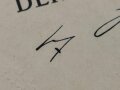 Adolf Hitler, eigenhändige Unterschrift auf großformatiger Ernennungsurkunde zum Oberstintendant, datiert 1943. Guter Zustand, in der eierschalfarbenen Mappe