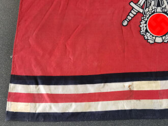 N.S. Reichskriegerbund ( NSRKB ) Fahne. Getragenes Stück mit diversen, teils wohl auch moderneren Raparaturstellen. Maße 145 x 120cm