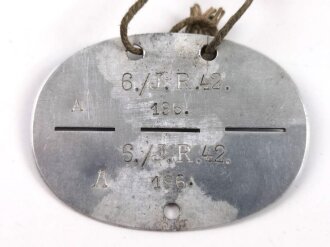 Erkennungsmarke Wehrmacht aus Aluminium eines Angehörigen " 6./J.R.42. " 6. Jäger- Regiment 42