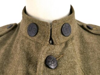 U.S. WWI wool service tunic. The soldier was an Engineer and part of the AEF in the 33rd Army Division. tunic made by "Leibowitz Brothers, Brookly New York 1918"