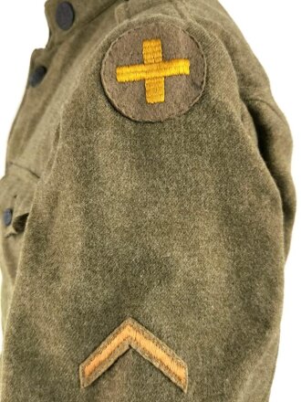 U.S. WWI wool service tunic. The soldier was an Engineer and part of the AEF in the 33rd Army Division. tunic made by "Leibowitz Brothers, Brookly New York 1918"