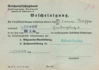 Reichsluftschutzbund Landesgruppe Nordmark "Bescheinigung einer Laienhelferin aus Lübeck", datiert 1938, geknickt