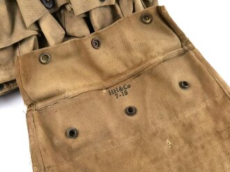 U.S. WWI, Model 1917  enlisted medical belt with unusual pouch attached. Buckle damaged with old " repair" hard to find