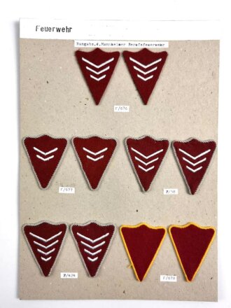 Ärmelabzeichen, Verschiedene Rangabzeichen der Berufsfeuerwehr Mannheim, alle auf Karton mit Doppelseitigem Klebeband aufgeklebt