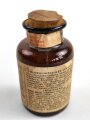 Glasflasche "Hautentgiftungssalbe" datiert 1944. Gesamthöhe 9,5cm. NUR FÜR DEKORATIONSZWECKE
