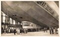 Ansichtskarte "Graf Zeppelin startbereit in der Halle" Stempel Zur Erinnerung an den Besuch in der Zeppelin Luftschiffwerft