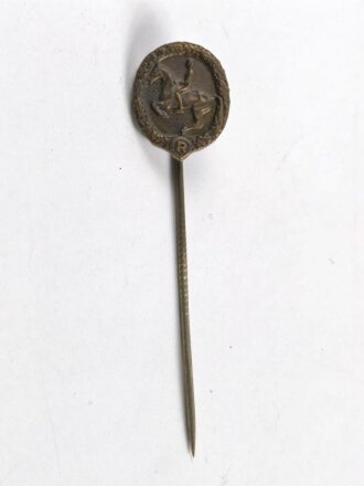 Miniatur, Reiterabzeichen in Bronze mit Hersteller auf der Rückseite, Größe 16mm