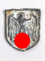 Adlerschild zum Tropenhelm der Wehrmacht. Ungereinigter Bodenfund