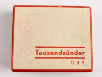 "Tausendzünder" Taschenfeuerzeug in Verpackung mit Anleitung, dise mit Druckvermerk von 1937, ungebraucht, Funktion nicht geprüft