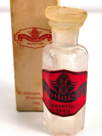 Glasbehälter " Salmiakgeist "in der originalen Umverpackung.  Für Luftschutzzwecke. Datiert 1942 , Höhe 9 cm