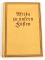 "Afrika zu unseren Füßen" datiert 1925, 153 Seiten, über DIN A5, gebraucht