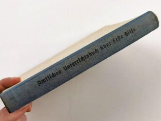 "Amtliches Unterrichtsbuch über Erste Hilfe", datiert 1941, 263 Seiten, gebraucht