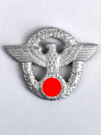 Adler für eine Schirmmütze der Feuerwehr III.Reich aus Aluminium, Splinte fehlen