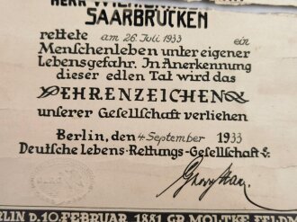 Deutsche Lebensrettungsgesellschaft DLRG , Ehrenzeichen "Für Lebensrettung" mit zugehöriger Anerkennungsurkunde, diese leider defekt. Ausgestellt 1933